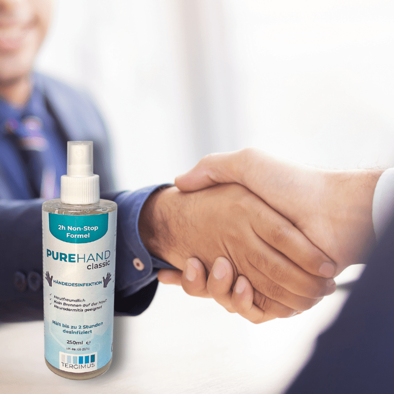 PUREHAND Classic 250 ml Händedesinfektion beim Händeschütteln im Büro