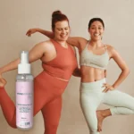 Zwei Frauen in Sportkleidung neben PUREMANENT Yoga 100 ml Sprühflasche